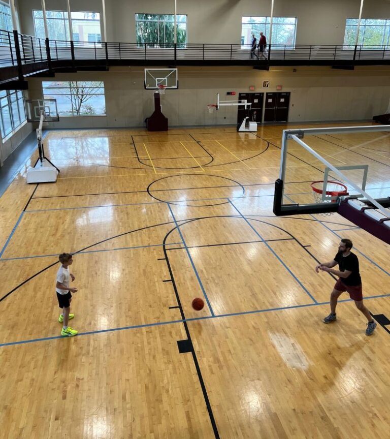 Basketball court inside Hawthorn Farm Athletic Club in Hillsboro, Oregon, showcasing the indoor space used for basketball, pickleball, and squash.